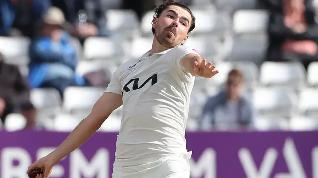 James Taylor bowling for Surrey