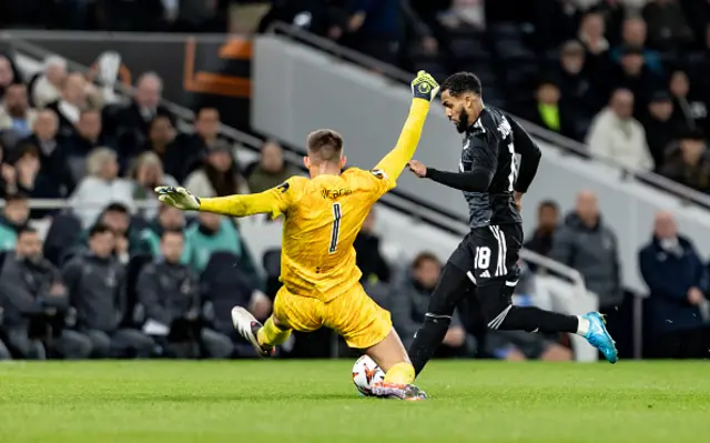 Tottenham Hotspur's goalkeeper Guglielmo Vicario tackles Qarabag FK's Juninho