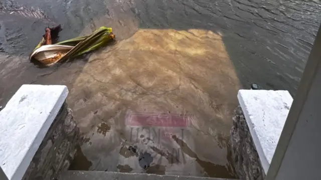 ML Ferguson's front porch as water continues to rise