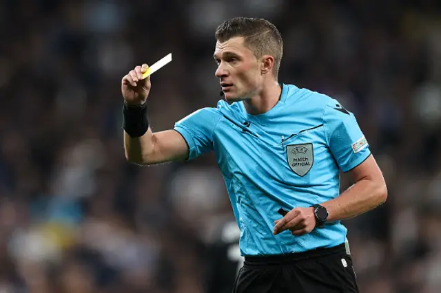 Willy Delajod of France shows a yellow card