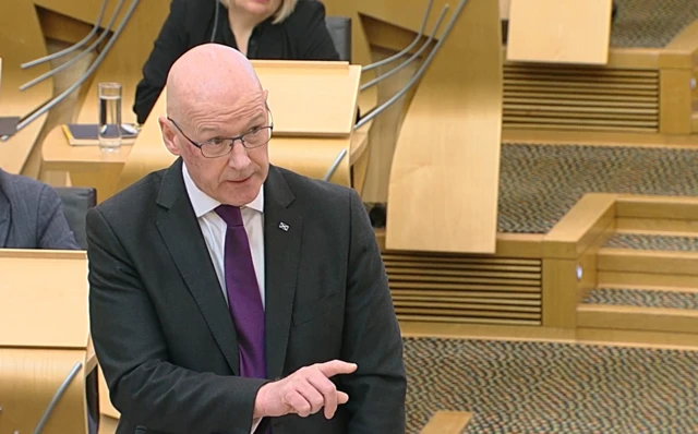 John Swinney answering Douglas Ross at FMQs