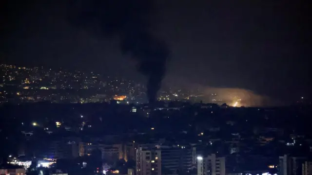 Smoke billows over Beirut's southern suburbs, amid ongoing hostilities between Hezbollah and Israeli forces