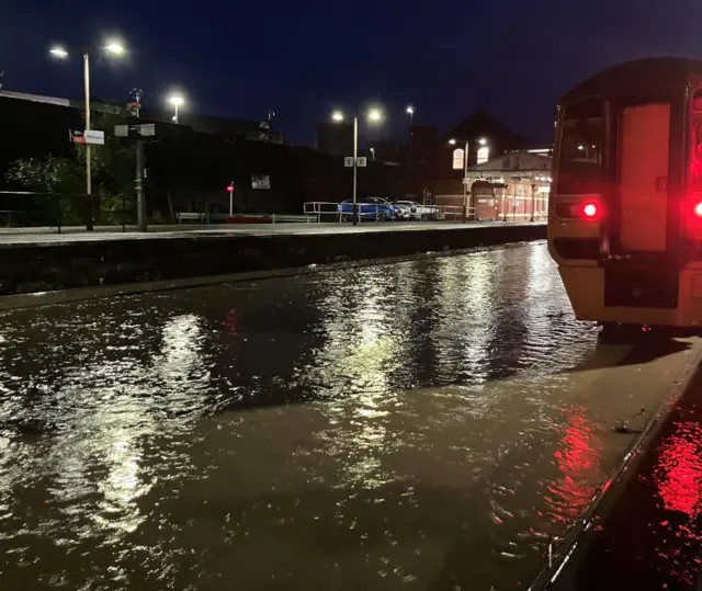 Water flooding the railway tracks