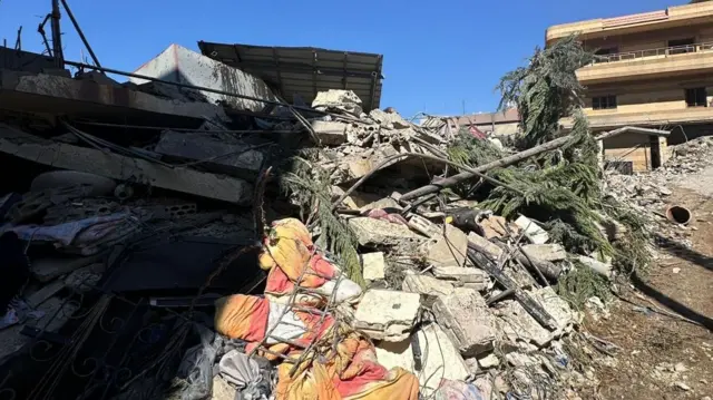 Rubble from destroyed buildings in Shebaa