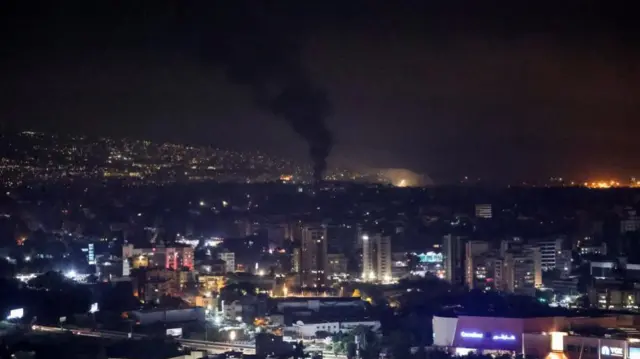 Smoke billows over Beirut's southern suburbs, amid ongoing hostilities between Hezbollah and Israeli forces