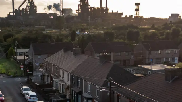 Houses in Port Talbot, with the steelworks in the background