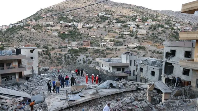 Lebanese Red Cross teams conducted search and rescue operations in the rubble of collapsed buildings following an Israeli army attack in Nabatieh province of southern Lebanon, on September 27, 2024.