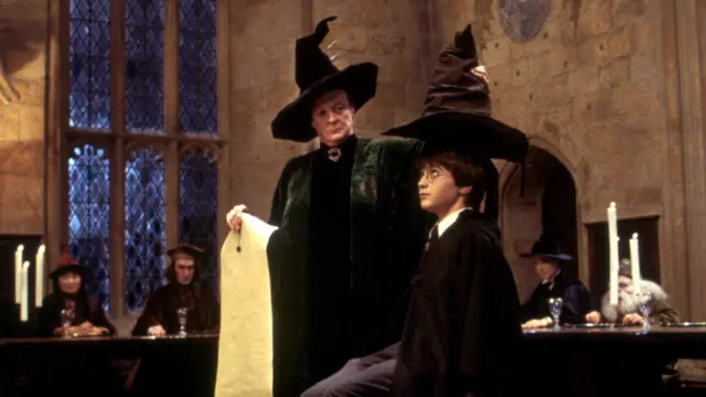 A still from the Harry Potter film in which Dame Maggie places the sorting hat on your Radcliffe's head.