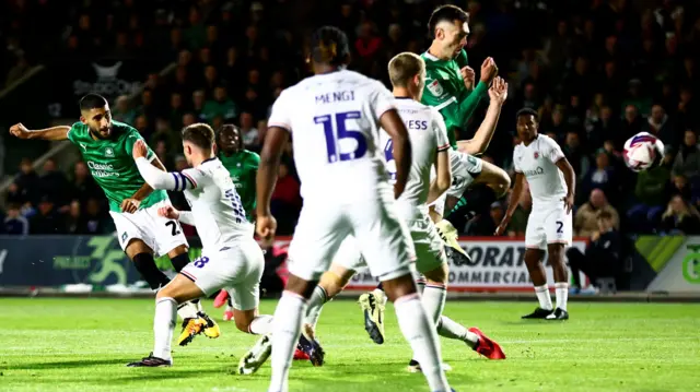 Rami Al Hajj (left) fires Plymouth into the lead against Luton