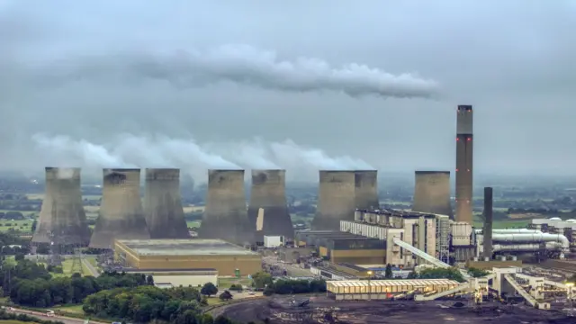 An aerial view of Ratcliffe On Soar Power Station emitting steam on 19 September 2024