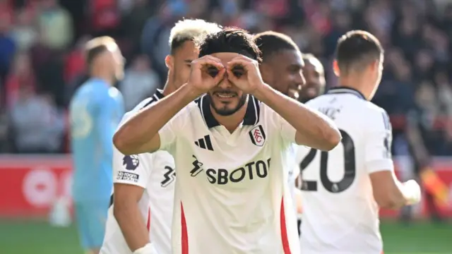 Raul Jimenez of Fulham celebrates after scoring his team's first goal from the penalty spot during the Premier League match between Nottingham Forest FC and Fulham FC at City Ground on September 28, 2024 in Nottingham, England.