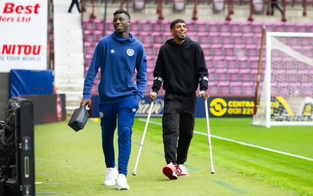 Hearts' Musa Drammeh and Gerald Taylor