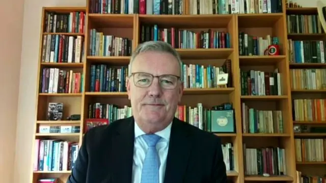 Mike Nesbitt delivering conference speech remotely