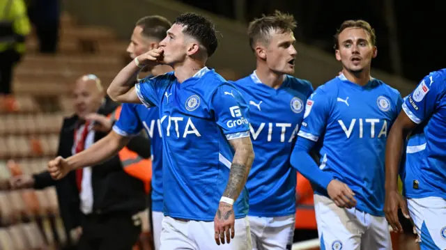 Stockport goalscorer Louie Barry blows a kiss to the travelling support