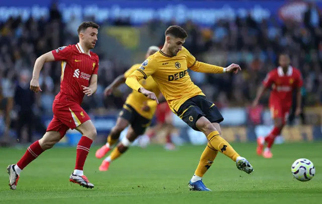 Santiago Bueno of Wolverhampton Wanderers passes the ball