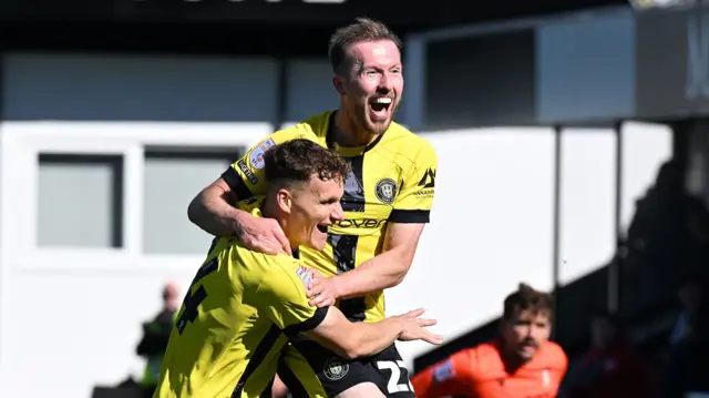 Stephen Dooley celebrates scoring for Harrogate