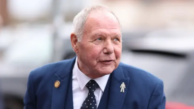 Barry Fry heading to a Peterborough game