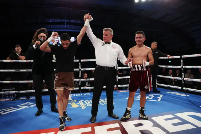 Galal Yafai has his hand raised in the ring