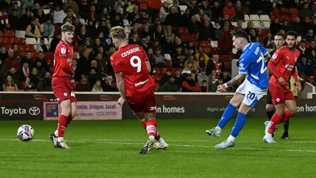 Stockport's Louie Barry fires in the equaliser at Barnsley