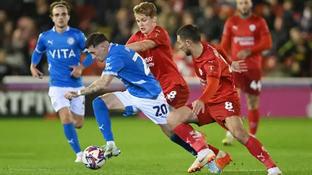 Stockport's Louie Barry tries to dribble into space against Barnsley