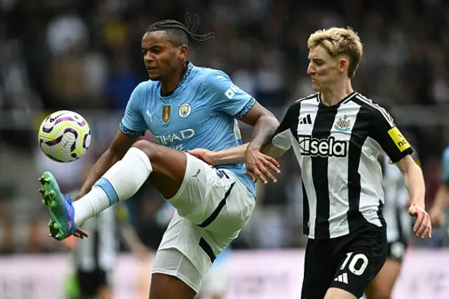 Manuel Akanji (L) vies with Newcastle United's English midfielder #10 Anthony Gordon