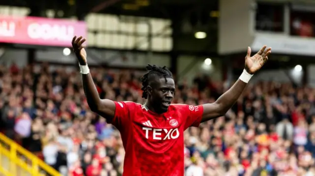 ABERDEEN, SCOTLAND - SEPTEMBER 14: Aberdeen’s Pape Gueye celebrates scoring to make it 2-0 during a William Hill Premiership match between Aberdeen and Motherwell at Pittodrie Stadium on September 14, 2024, in Aberdeen, Scotland. (Photo by Craig Foy / SNS Group)