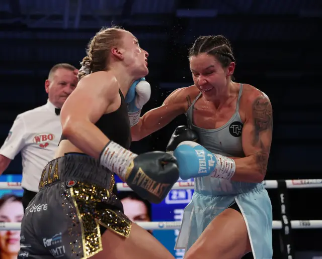 Terri Harper lands clean on Rhiannon Dixon under the chin