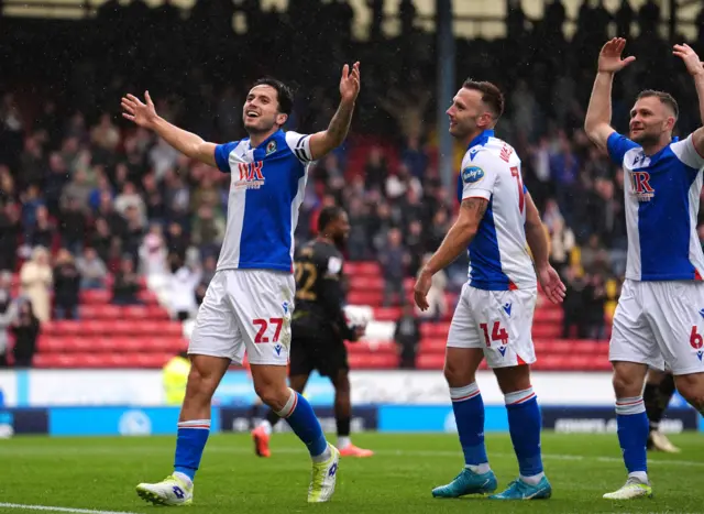 Blackburn Rovers' Lewis Travis celebrates