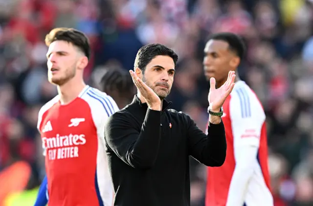 Mikel Arteta, Manager of Arsenal, applauds the fans