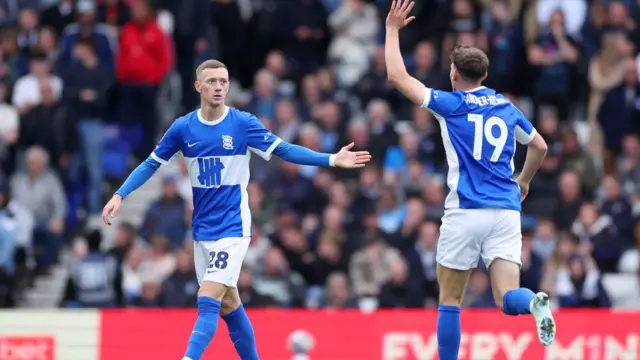 Birmingham City's Jay Stansfield celebrates with teammate Taylor Gardner-Hickman