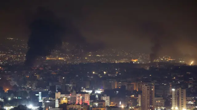 Smoke billowing over Beirut after air strikes