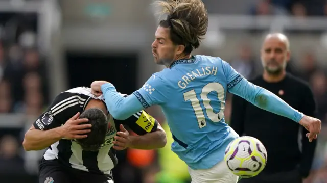 Fabian Schar and Jack Grealish