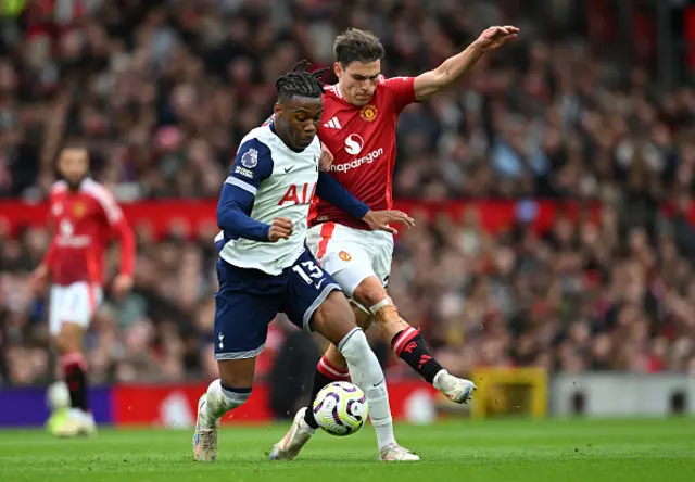 Destiny Udogie of Tottenham Hotspur is challenged by Manuel Ugarte