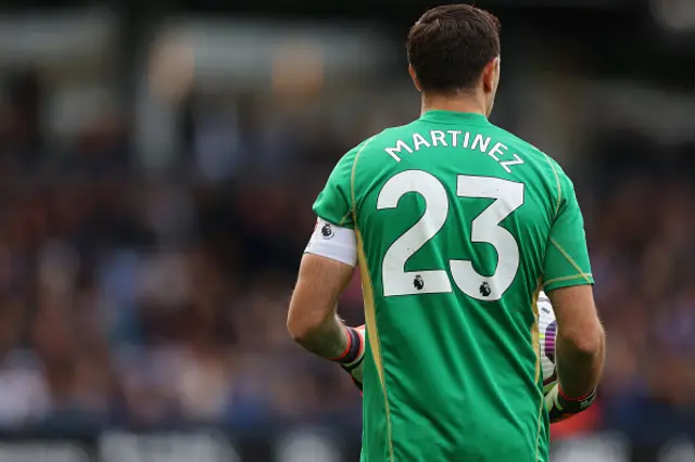 Emiliano Martinez of Aston Villa looks on