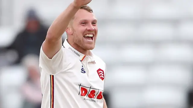 Jamie Porter celebrates wicket