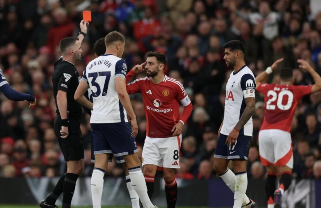 Bruno Fernandes is shown a red card