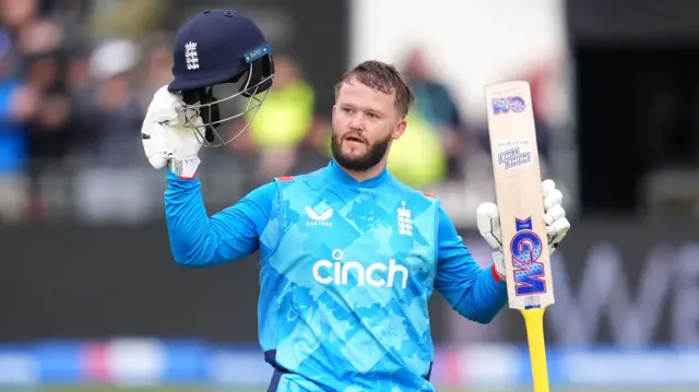 England's Ben Duckett celebrates his century during the fifth one day international match at the Seat Unique Stadium