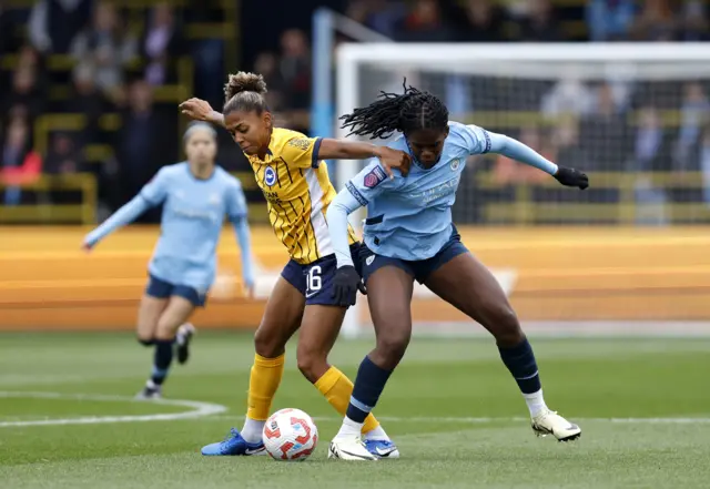 Khadija Shaw battles for the ball