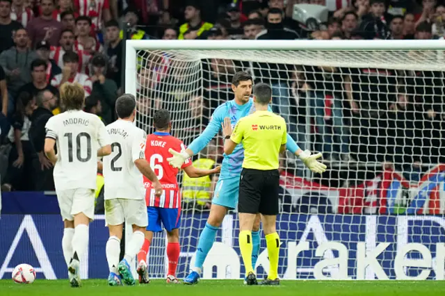 Thibaut Courtois goalkeeper of Real Madrid and Belgium talks to the referee