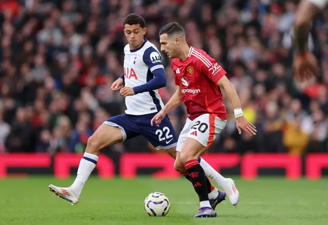 Diogo Dalot of Manchester United and Brennan Johnson