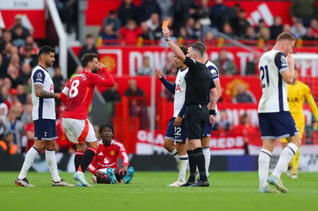 Bruno Fernandes of Manchester United is shown a red card