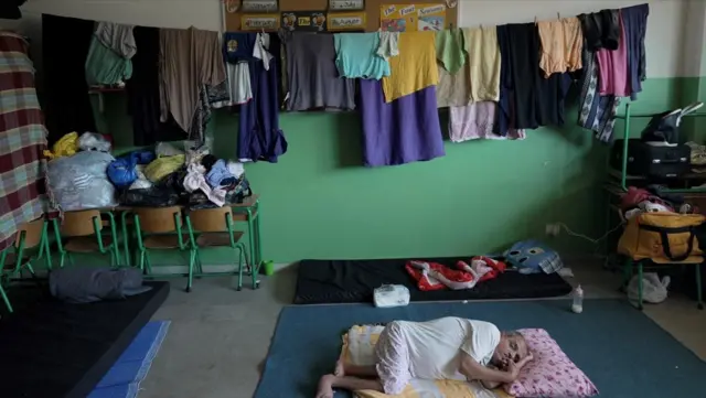 A classroom covered with laundry