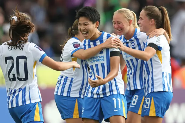 Kiko Seike of Brighton & Hove Albion celebrates