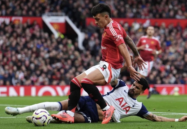 Dominic Solanke slides in on Martinez