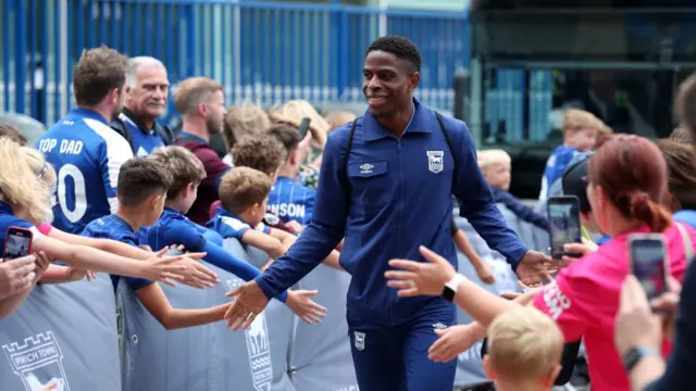 Chiedozie Ogbene of Ipswich Town arrives at the stadium prior to the Premier League match between Ipswich Town FC and Fulham FC at Portman Road on August 31, 2024 in Ipswich, England.