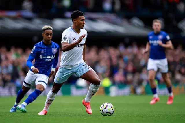 Ollie Watkins runs with the ball