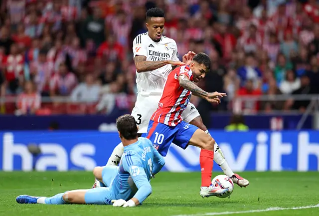 Angel Correa of Atletico de Madrid runs with the ball