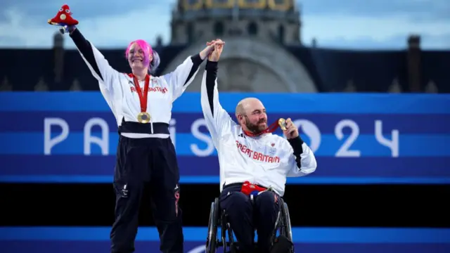 Gold medalist Jodie Grinham and Nathan MacQueen of Team Great Britain