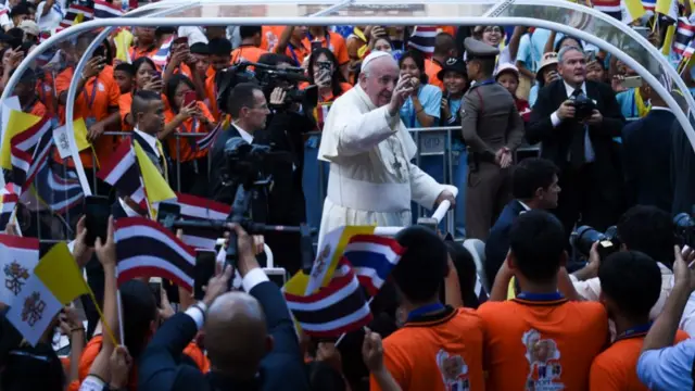 Pope Francis greets supporters at the Holy Mass ceremony at Assumption Cathedral in Bangkok, Thailand, 22 November 2019