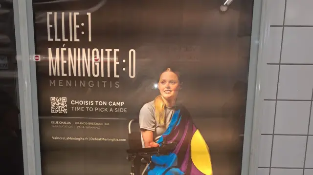 Meningitis awareness poster at Nanterre Préfecture RER station featuring swimmer Ellie Challis